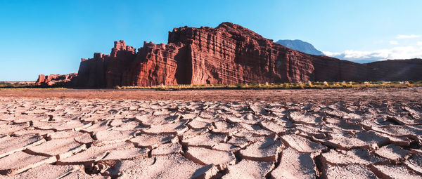 Panoramic view of rocks and mountains against sky