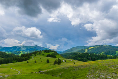A picturesque landscape view of the french alps mountains on a cloudy summer day