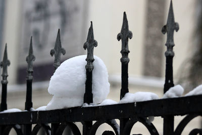 Close-up of metal railing during winter