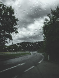 Close-up of wet window in rainy season