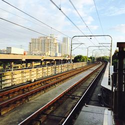 Railroad tracks against sky