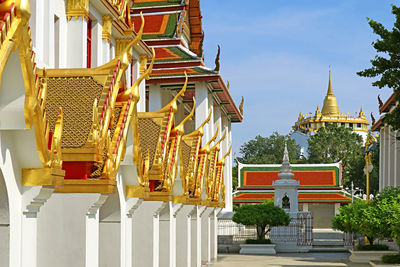 Wat ratchanatdaram temple with phu khao thong golden mount pagoda in afar, bangkok city, thailand