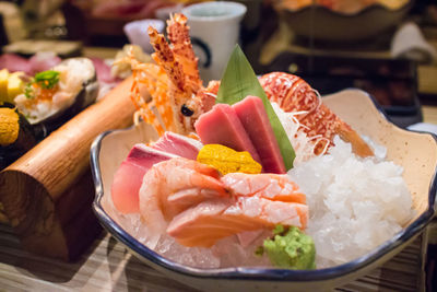 Close-up of sashimi in bowl on table