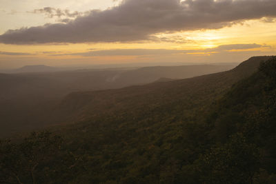 Scenic view of mountains against sky during sunset