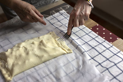 High angle view of man working on table