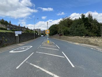 The main road, as it enters the village of, queensbury, bradford, uk