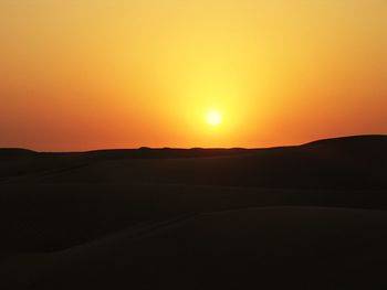 Scenic view of mountains at sunset