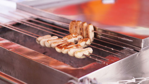 High angle view of meat on barbecue grill