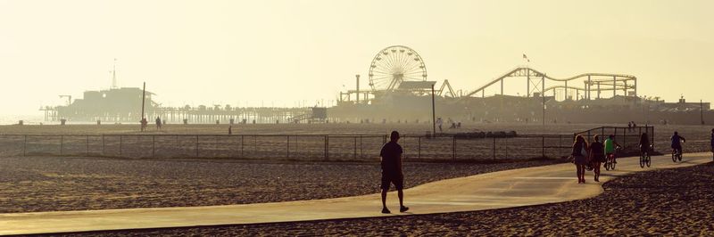 Silhouette of woman at sunset