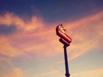 Low angle view of cloudy sky at sunset