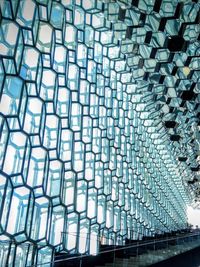 Low angle view of glass ceiling in building