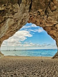 Scenic view of beach against sky