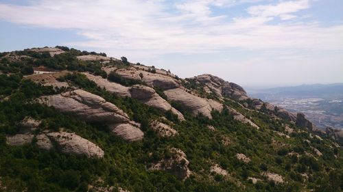 Scenic view of rocky mountains against sky