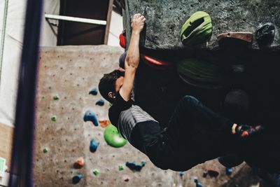 High angle view of boy playing with ball