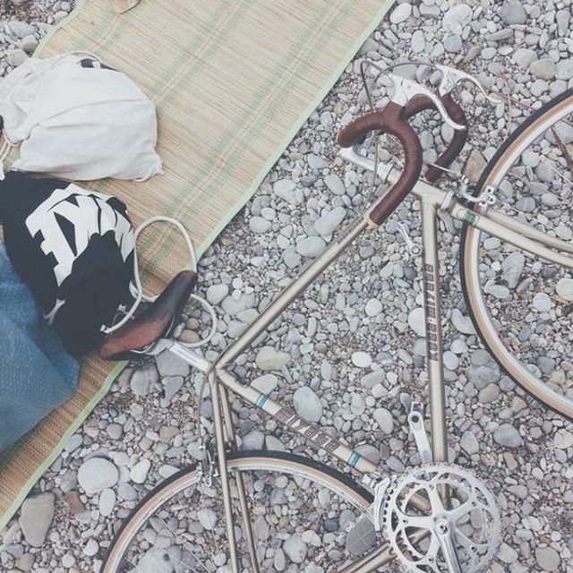 high angle view, indoors, bicycle, low section, metal, transportation, shoe, directly above, person, pattern, wheel, lifestyles, men, standing, leisure activity, day, part of, railing