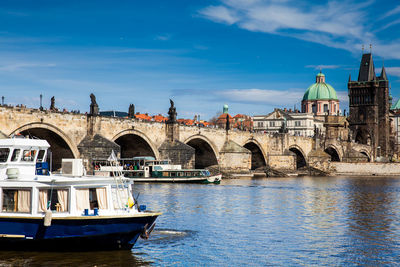 The medieval charles bridge over the vltava river in prague city