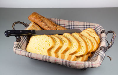 High angle view of bread on table against white background