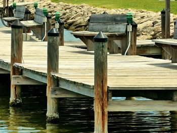 Wooden posts in lake