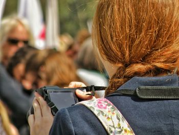 Close-up of woman holding guitar