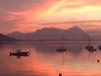 Scenic view of lake at sunset