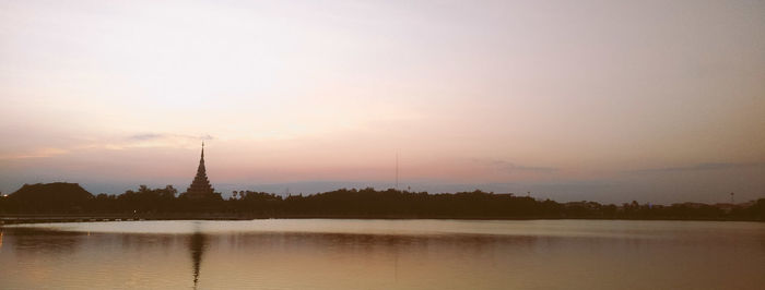 Scenic view of lake against sky during sunset