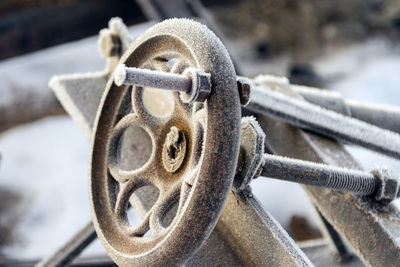 Close-up of frost on machinery