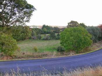 Scenic view of land against clear sky