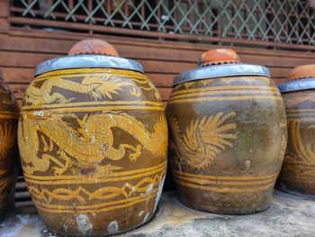 Close-up of rusty metal on table