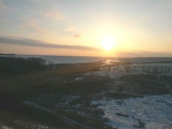 Scenic view of sea against sky during sunset