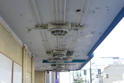 Ceiling of building on street weathering off