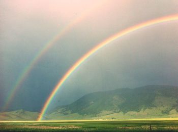 Scenic view of rainbow against sky