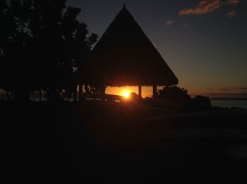 View of built structures at sunset