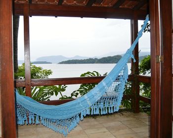 Scenic view of sea seen through balcony