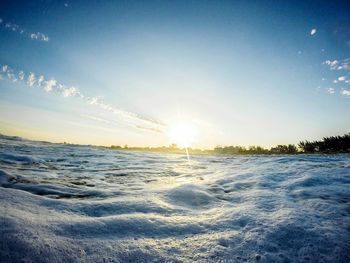 Scenic view of sea against sky at sunset