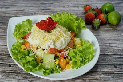 Close-up of salad served on table