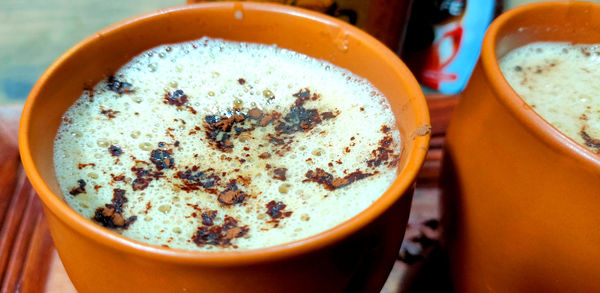 Close-up of cappuccino on table