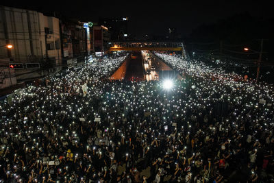 High angle view of illuminated street lights at night