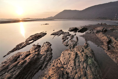 Scenic view of sea against sky during sunset