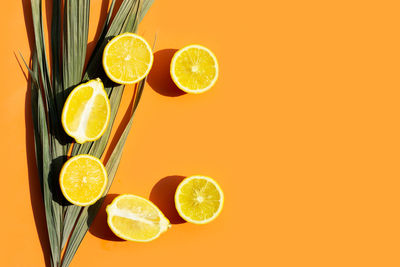 Full frame shot of orange fruit against white background