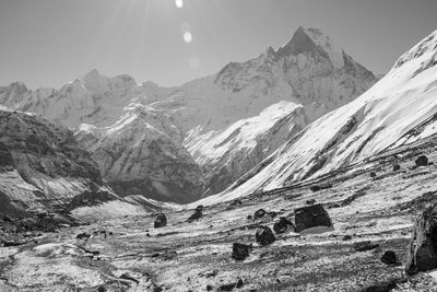 Scenic view of snowcapped mountains against sky