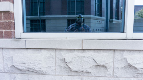 Statue in front of building