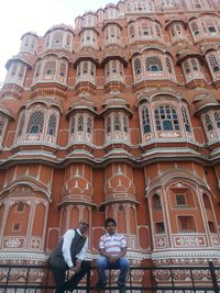 Low angle view of statues on historic building