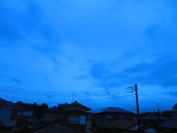 Low angle view of houses against sky