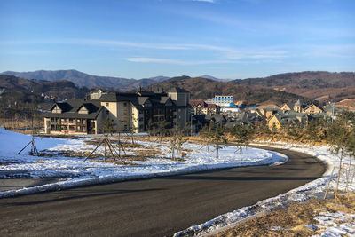 Cityscape alpensia ski resort against blue sky, pyeongchang, south korea