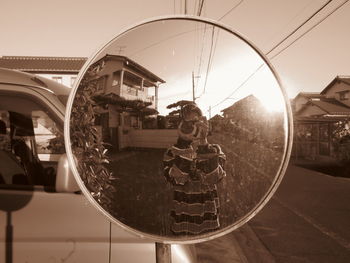 Reflection of man on glass window