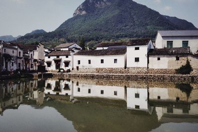 Reflection of buildings in lake