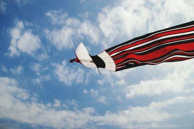 Low angle view of flag against sky