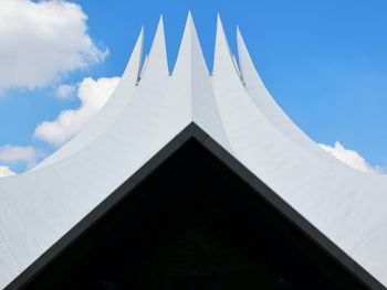 Low angle view of built structure against blue sky