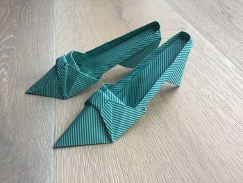 High heels made from papers on wood
