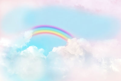 Low angle view of rainbow in sky